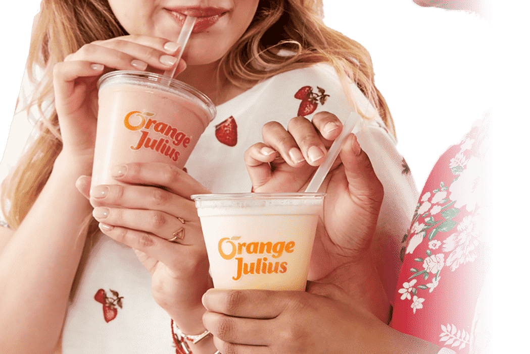 two people drinking Orange Julius